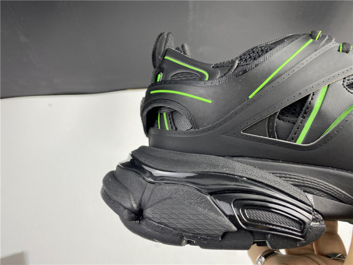 blcg track trainer black green 542436 w2la1 2042